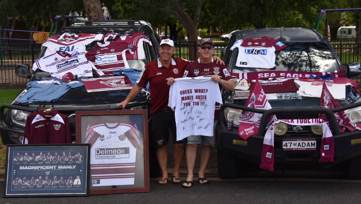 MANLY FOREVER: Tony Devine and Adam Jones are loud and proud when it comes to their love for the Manly Warringah Sea Eagles. Photo: Jay-Anna Mobbs