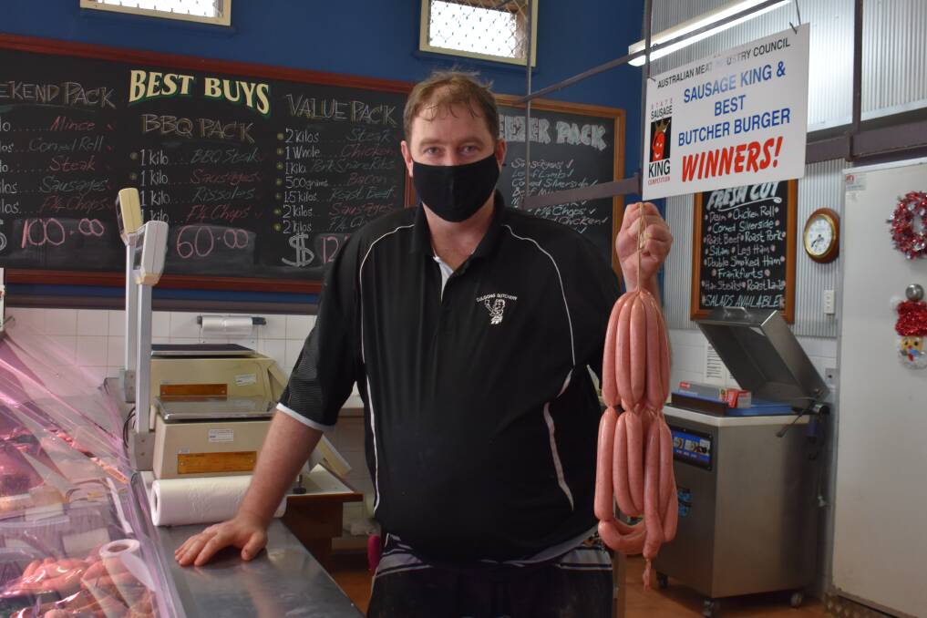 WINNERS: Peter Roche with some of Gulgong Butchery's award-winning traditional beef thin sausages. Picture: JAY-ANNA MOBBS