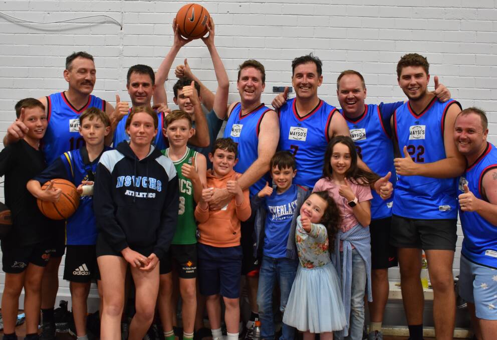 WINNERS ARE GRINNERS: Mayso's Pro Shop players with their kids after taking out the Mudgee Men's Basketball A grade grand final. Picture: JAY-ANNA MOBBS