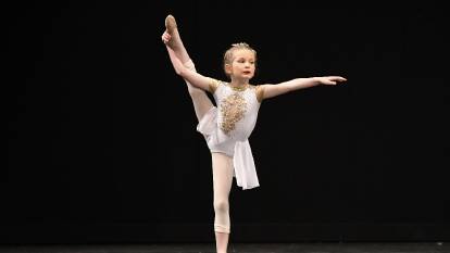 SKILL: Eight-year-old Violet Smith centre stage during a lyrical routine. Picture: WINKIPOP MEDIA