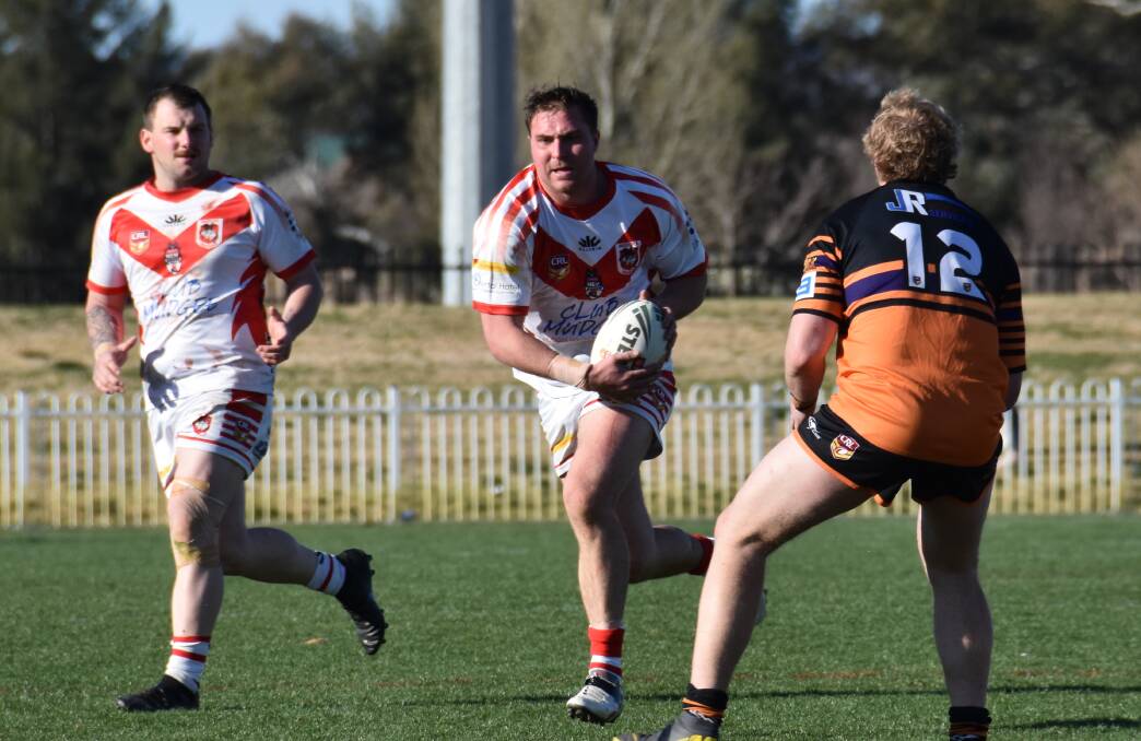 ON THE RUN: Hamish Bryant about to take on a Lithgow Workie in a 2019 Group 10 match at Glen Willow. Picture: JAY-ANNA MOBBS