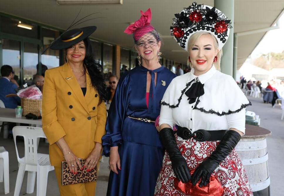 DRESSED UP: Liliana Birchall, Carmen Holden-Smith and Michelle Meyers pictured at last year's Gooree Cup race meet. Photo: Simone Kurtz