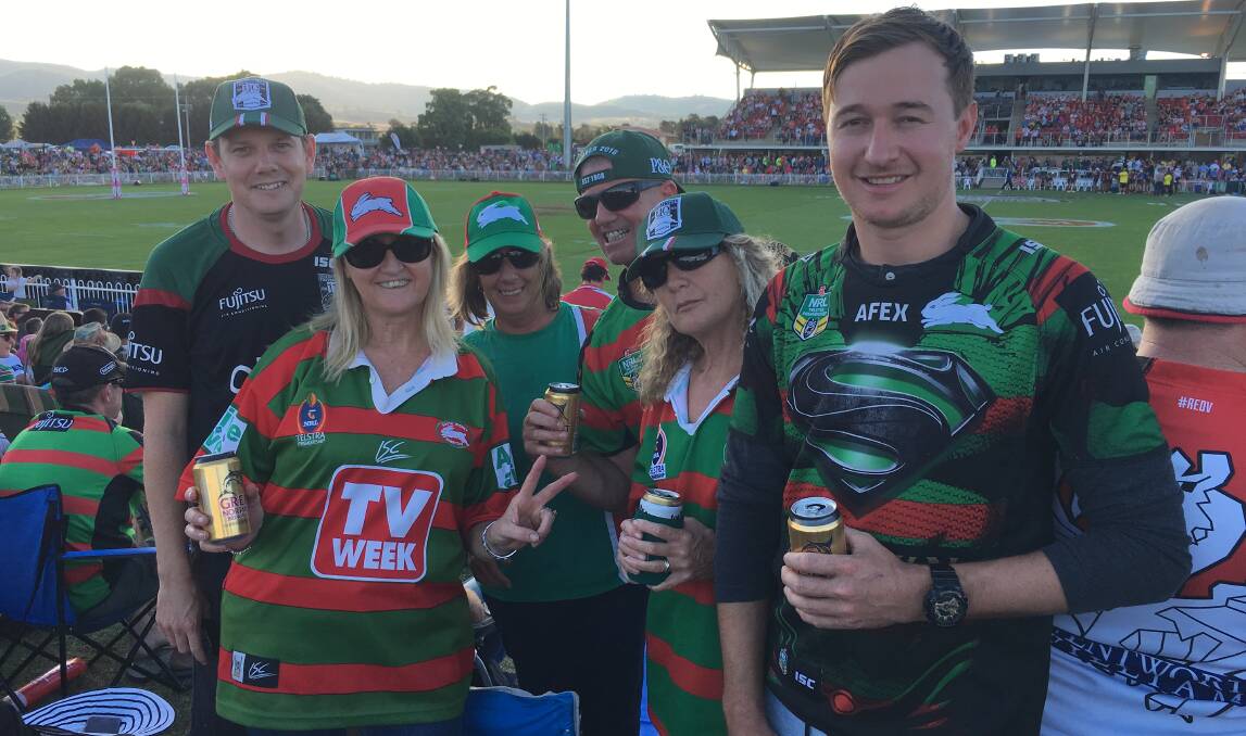BLEEDING RED AND GREEN: Toni Wood (bunny ears) and her family are longtime South Sydney Rabbitohs fans. Photo: Supplied
