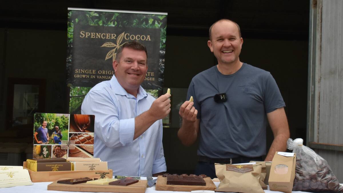 CHOCOLATE: Member for the Dubbo Electorate, Duglad Saunders with Spencer Cocoa's head chocolate maker, Luke Spencer holding a slice of chocolate. Picture: JAY-ANNA MOBBS