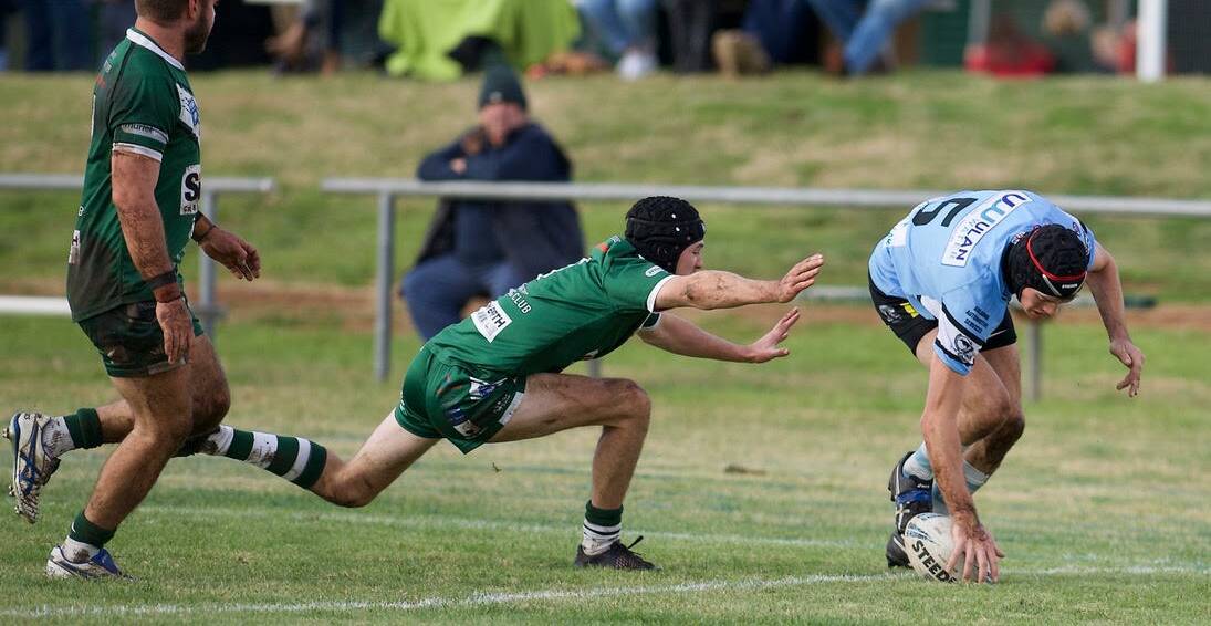 Gulgong winger, Toby O'Leary scoring in the corner in their game against Dunedoo on Saturday. Picture: Peter Sherwood Photography