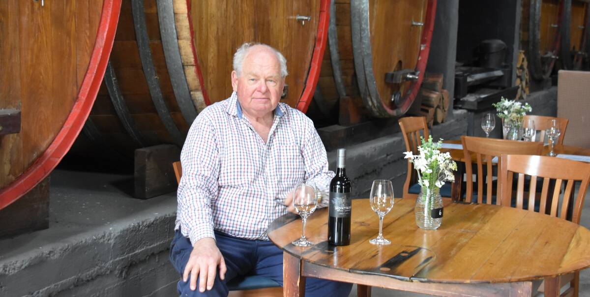 CLASS OF THEIR OWN: Craigmoor and Montrose ambassador Pat Auld with a bottle of the trophy winning Mudgee Montrose Black Shiraz 2018. Photo: Jay-Anna Mobbs