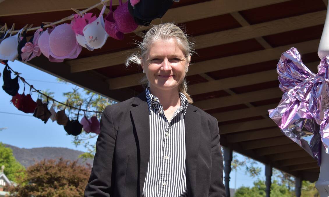 PINK UP: Signature Properties Mudgee director, Edwina Smith with the clothesline full of pinked up bras. Picture: JAY-ANNA MOBBS 