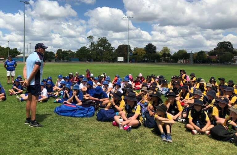WELCOME TO HOCKEY: Hockey NSW Regional Participation Coordinator, Glenn Johnstone introducing the students to hockey. Photo: Supplied