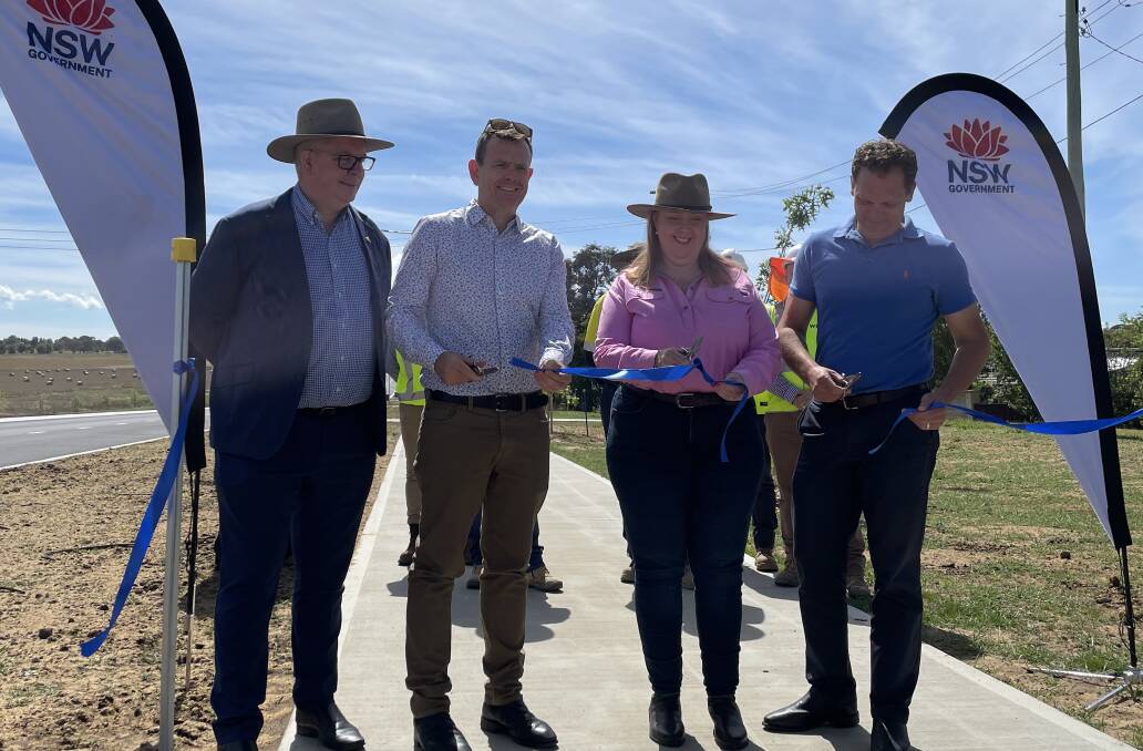 Transport for NSW's regional director west Alistair Lunn (left) was with Labor's Stephen Lawrence, the duty MLC for Bathurst; Regional Transport Minister Jenny Aitchison; and Bathurst mayor Jess Jennings at the recent ribbon-cutting for the widened highway from Kelso to Raglan.