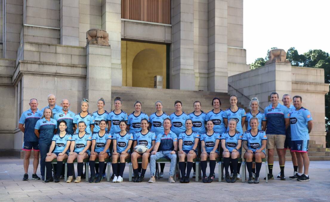 FEELING BLUE: Marita Shoulders (back, eighth from left) played in the first Police Rugby League State of Origin match last Fridat.