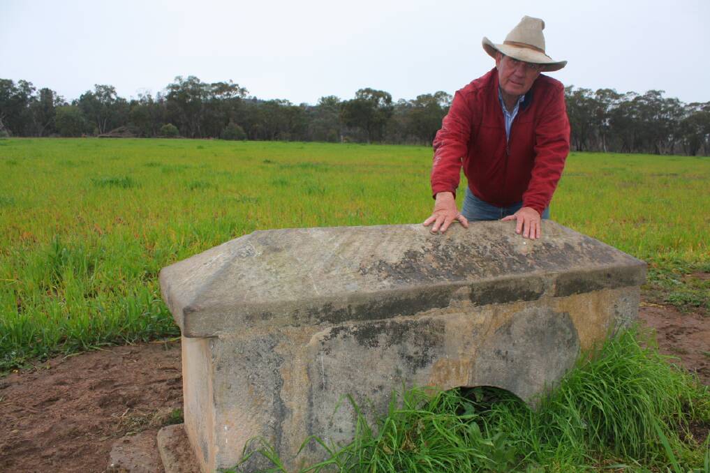 Present owner of Pine Ridge, Denis Woods, at the monument on the former trotting track marking the grave of the champion trotter, Fritz.