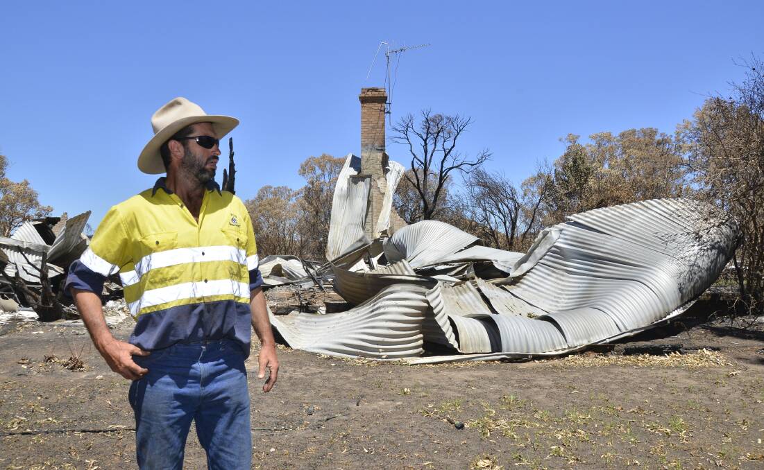 LEFT DEVASTATED: Chris Wentworth-Brown outside his home in the tiny village of Uarbry, which was virtually wiped out in the 2017 disaster. Photo: BELINDA SOOLE