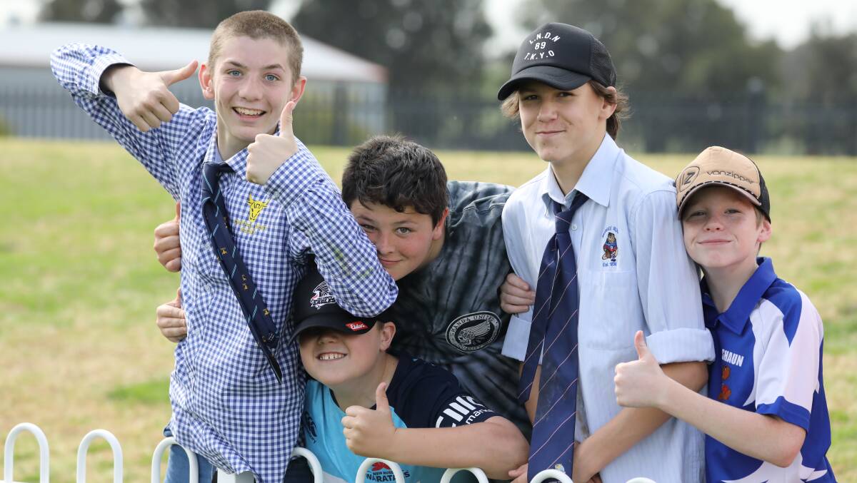 ALL SMILES: Some of the young Mudgee Wombats kids enjoying the NRC game at Glen Willow. Photo: SIMONE KURTZ