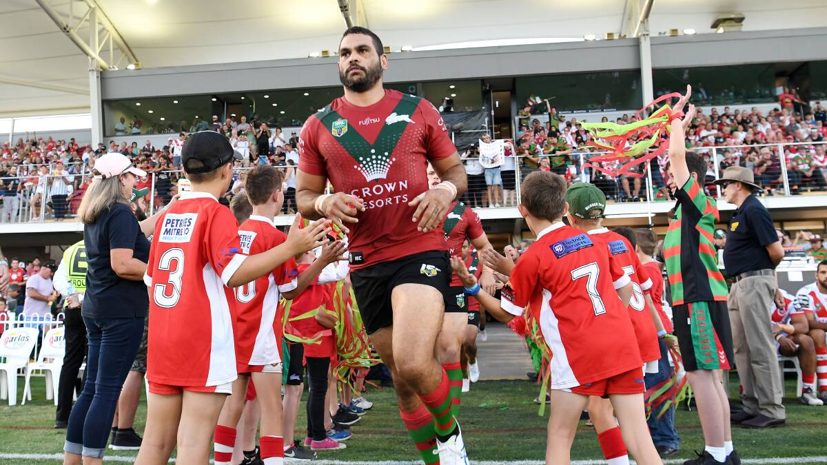 HE'S BACK: Greg Inglis runs out for the Rabbitohs for the first time since rupturing the ACL in his left knee in round one 2017. Photo: NRL PHOTOS