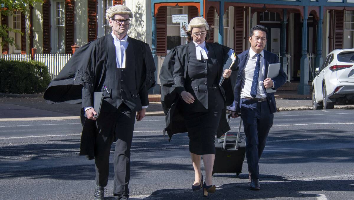 The barrister Nicholas Broadbent and the defence team arriving on day one of the trial. 