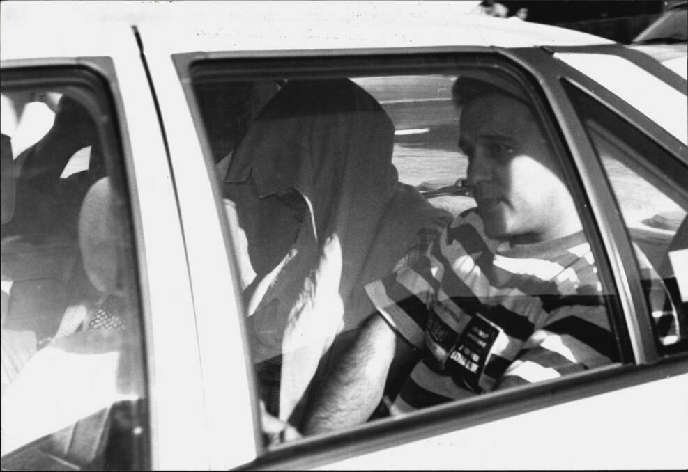 Backpacker murderer Ivan Milat was taken into custody in an early morning raid by NSW Police at Eagle Vale near Campbelltown. May 22, 1994. Photo: Greg White/Fairfax Media