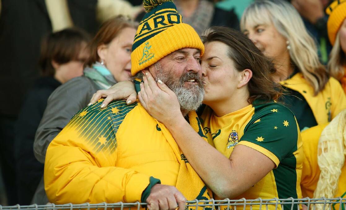 PROUD AS PUNCH: John Hamilton with daughter Grace after her Australian captaincy debut at Newcastle earlier this year. Photo: BUILDCORP WALLAROOS