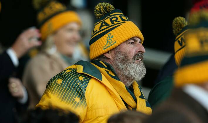 LEGEND OF THE GAME: John Hamilton watches on during daughter Grace's debut as Australian captain at Newcastle earlier this year. Photo: MARINA NEIL