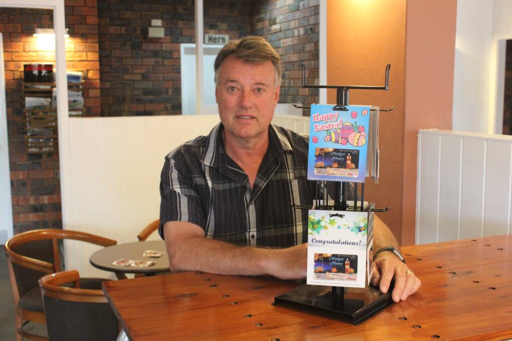 Gift: Mudgee Chamber of Commerce president Greg Dowker encourages people to get on board with the Mudgee Money gift card initiative. Photo: Jake Humphreys 