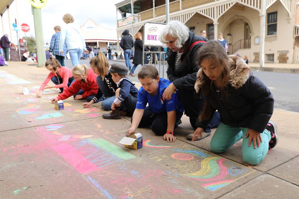 Colourful Contribution: Children will love all that there is to see and do, including the Pavement Art Competition. Photo: Simone Kurtz