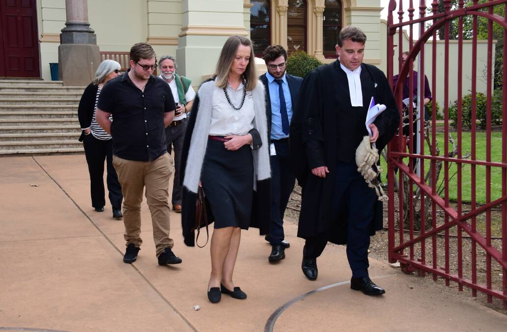 Family members of crash victim Reagen Skinner and supporters, and Crown prosecutor Mark Davies leave Dubbo District Court on Thursday after the sentence. Photo: BELINDA SOOLE.