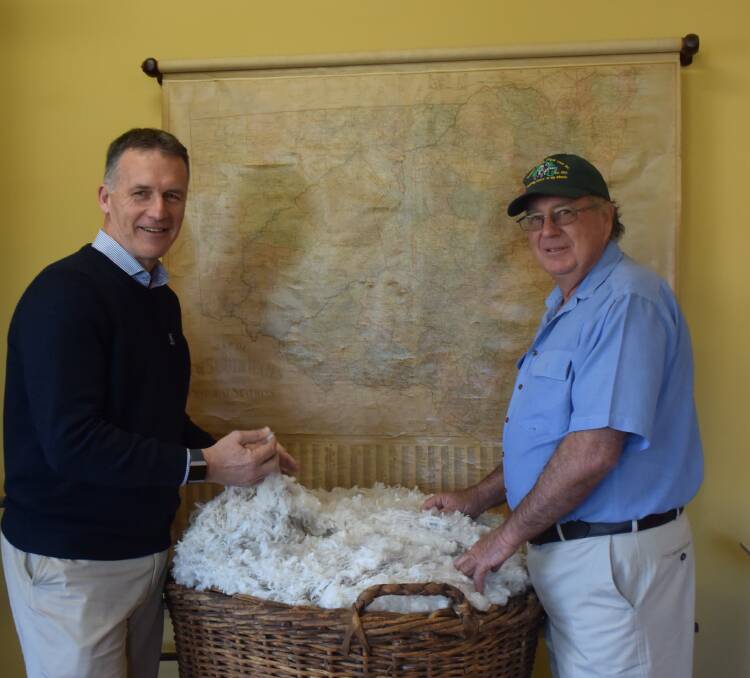 Australian Wool Exhange (AWEX) CEO Mark Grave with Gollan wool classer Rob Yeo. Photo: Taylor Jurd.
