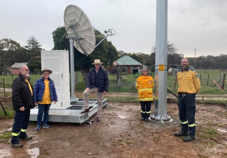 WELCOME NEWS: Member for Calare, Andrew Gee, with members of the Wattle Flat Rural Fire Service, pictured with the mobile small cell base.