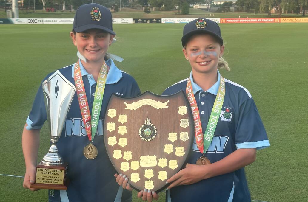 Poppi Stephen and Charlotte Shoemark celebrate their School Sport Australia Girls Under 12 Cricket Championship title in Darwin. Picture supplied.