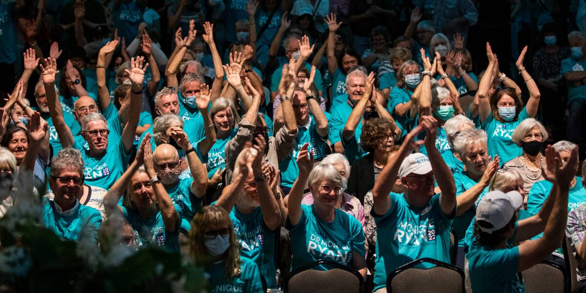Supporters of independent candidate for the seat of Kooyong, Dr Monique Ryan, seen during an election campaign launch in Melbourne. Picture: AAP 