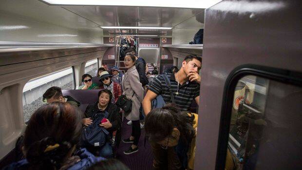 Cutting down on crowded trains. Picture: MICHELE MOSSOP