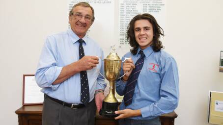 AWARD WINNER: Outgoing Dubbo Kangaroos under 17s player Pat Saul (right) with Rivwest Finance's Bob Elliot at the presentation of the perpetual trophy last week. Photo: BELINDA SOOLE