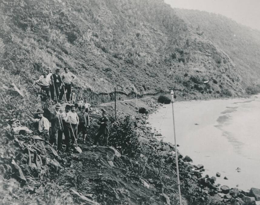 MAKING A PATH: The Great Ocean Road in its infancy as workers put in the countless hours to build what is now a world-class attraction. 