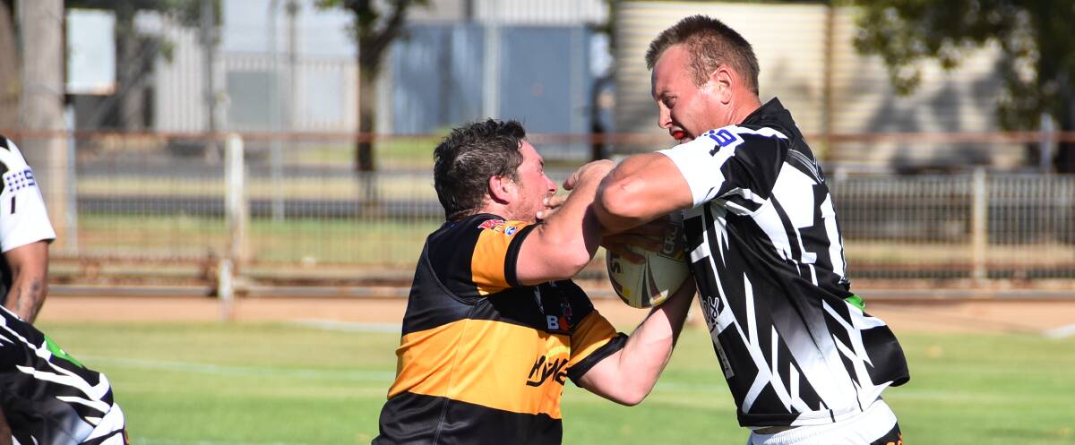 Josh Rainbow shrugs off an Oberon defender at Sid Kallas Oval on Sunday afternoon. He and the Magpies are aiming to make it two in a row.