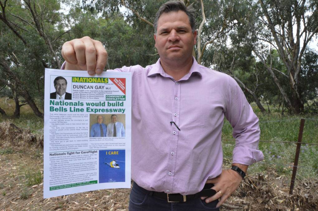 'Broken promise': Orange MP Phil Donato with the Nationals newsletter where Duncan Gay commits to building the Bells Line Expressway. 