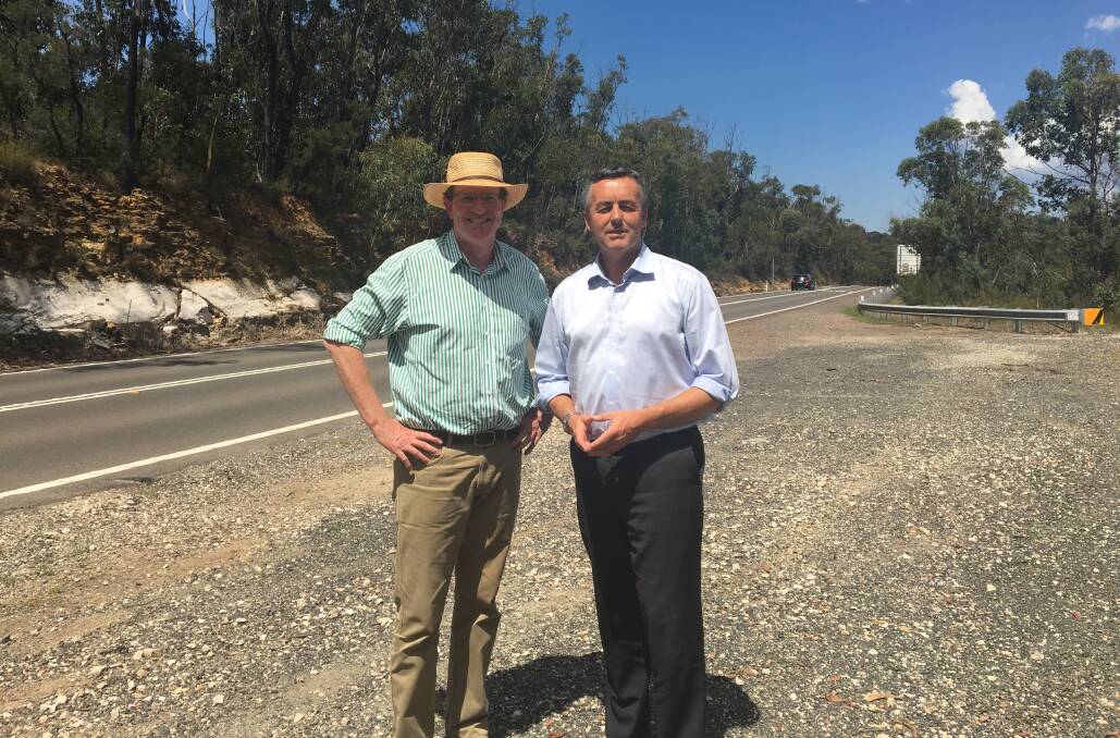Work to be done: Calare MP Andrew Gee and federal Roads Minister Darren Chester on the Bells Line of Road. Photo: CONTRIBUTED
