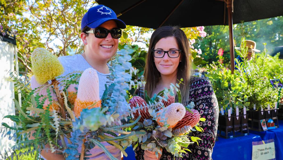 Kim and Melissa with bouquets from Bilby Blooms.