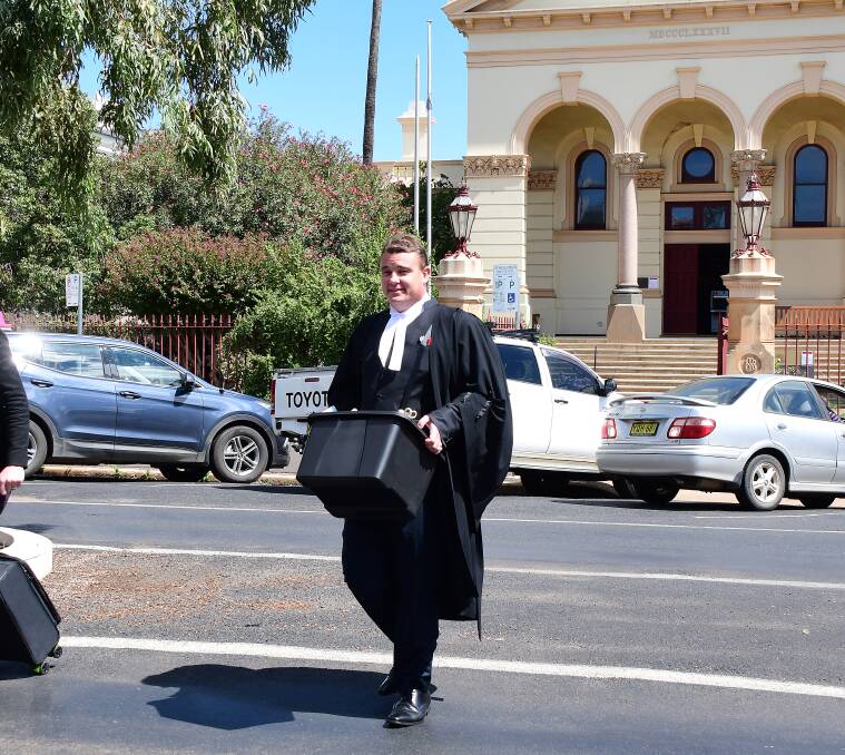 Crown prosecutor Mark Davies leaves the court earlier in the trial. 