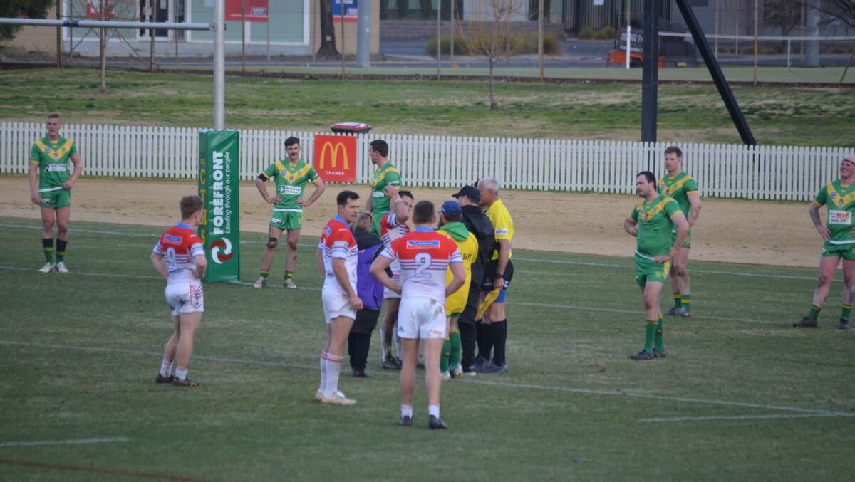 AT A HALT: Play was stopped during the first half in an incident that was put on report. Photo: LACHLAN HARPER 