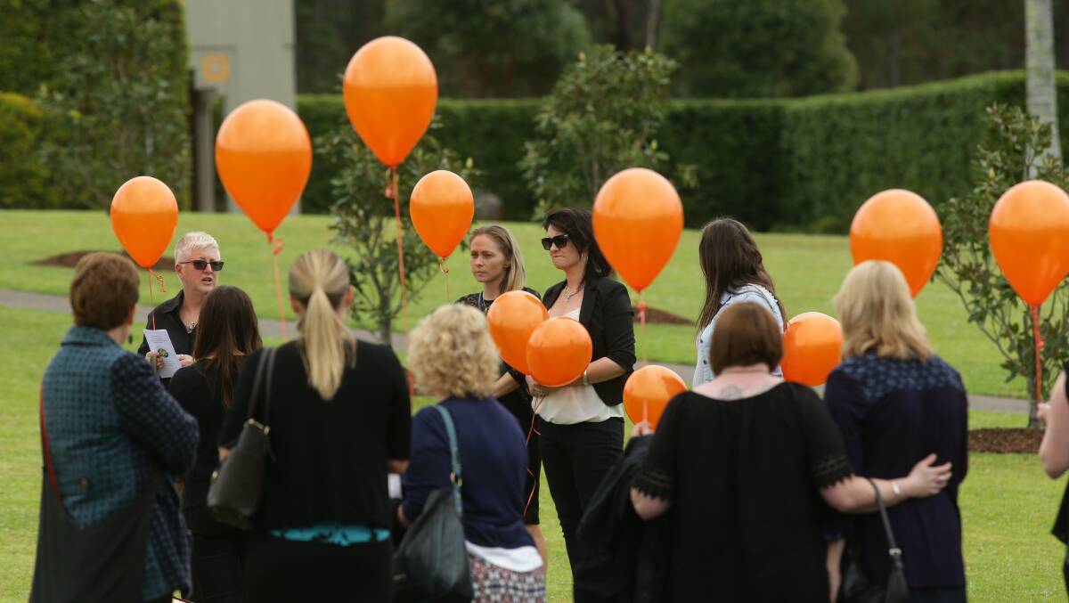 Mourners release balloons at the funeral of Molly Goodbun in 2016. Photo: Jonathan Carroll