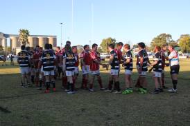 MUTUAL RESPECT: Molong and Narromine players shake hands after a competitive GrainCorp Cup Northern Division grand final on Saturday. Photo: JENNIFER HOAR