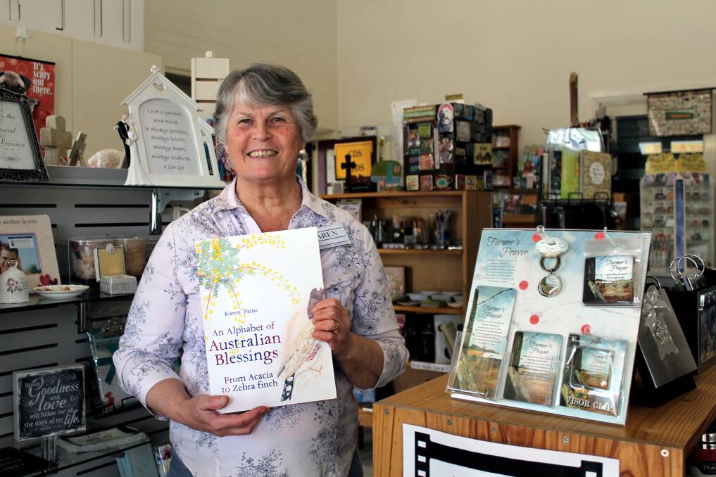Karen Paine with her book 'An Alphabet of Australian Blessings'.