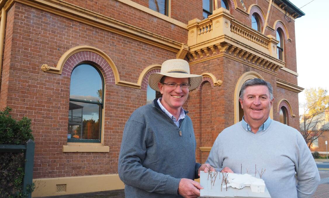 Federal member for Calare Andrew Gee and Mayor Des Kennedy at the precinct site at 90 Market Street, Mudgee.
