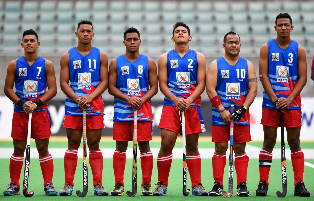 Mudgee's Nico Ioane (second from right) in the Samoan hockey team singing the National anthem.