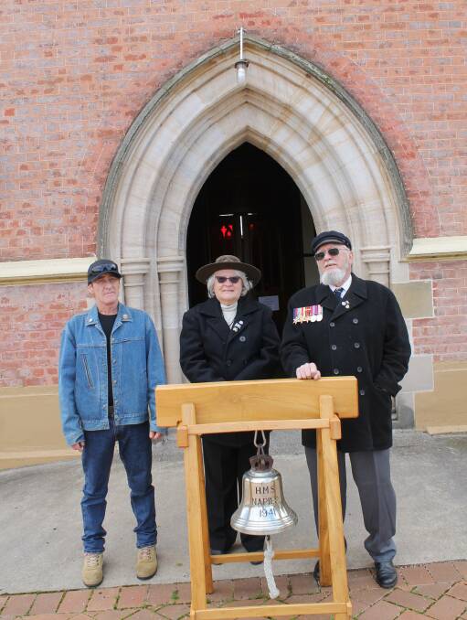 Fr David Craig, his wife Heidi and Malcolm Cruz (left) tolled the bells at St John's Anglican Church on Saturday. 