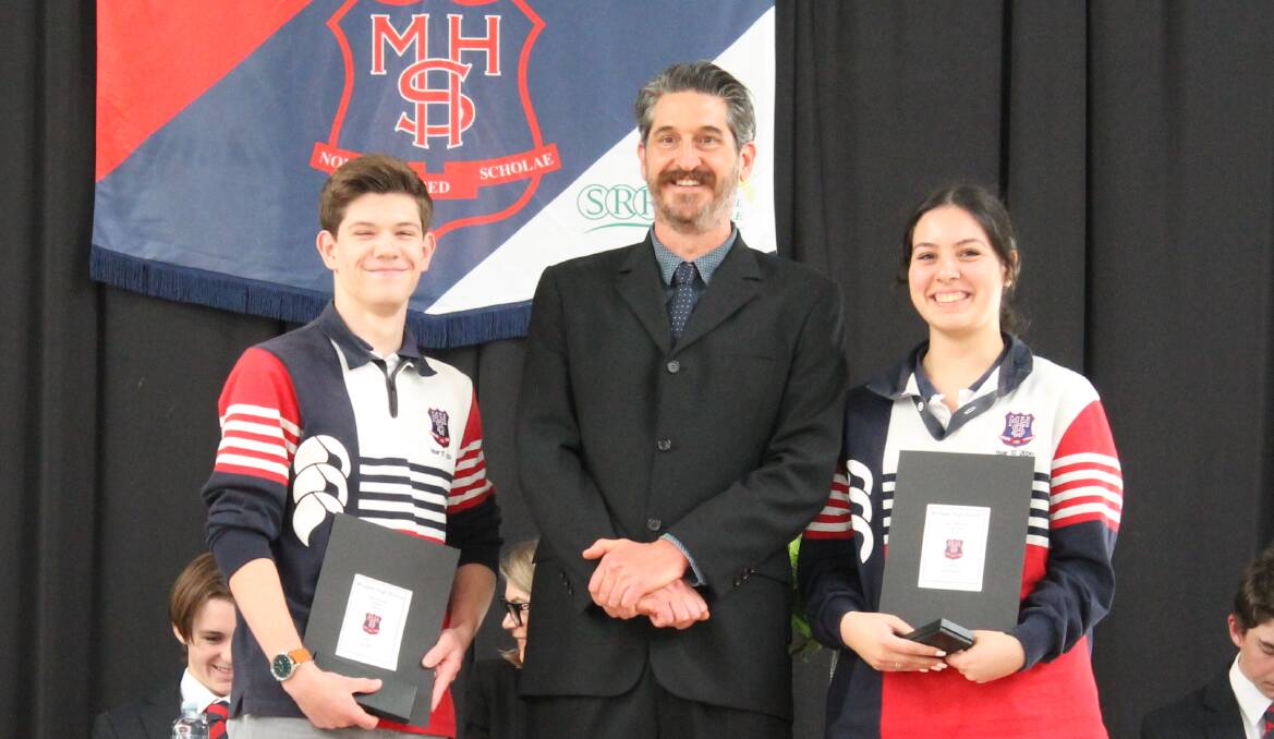 Adrian Couch and his Year Adviser's Award recipients Eric Milne and Celine Gironda.