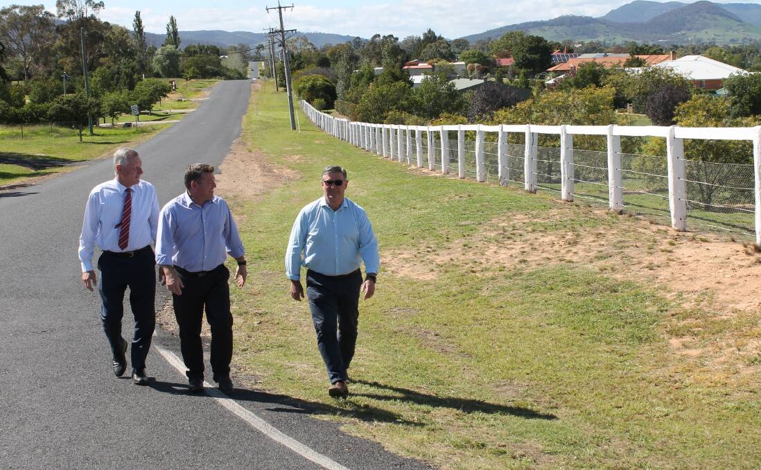 MWRC general manager Brad Cam, Dugald Saunders MP and mayor Des Kennedy check out part of Putta Bucca Road where the path will be added.