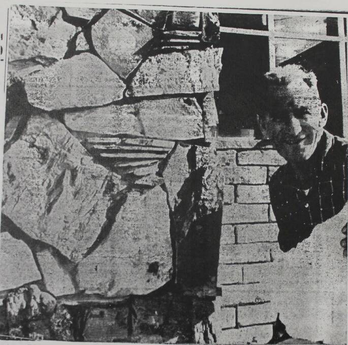 American Steve Corey, pictured in the Mudgee Guardian in 1967, adding the stone facade made of fossils and petrified wood - a claimed first for an Australian building.