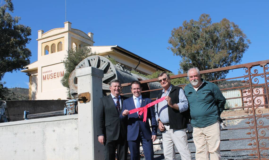 Buzz Sanderson (right), with Mayor Des Kennedy, Paul Toole MP, and Bernie George, in 2017 marking the completion of the Kandos Museum's landscaping of the outside display area.