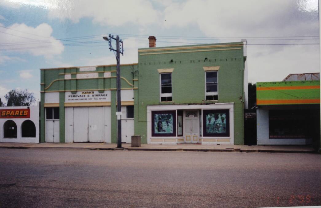 Circa 1999, the Alhambra building - then Kirk's Removals and Storage - and Roth's Wine Bar prior to both getting face-lifts, photo courtesy of Mudgee Historical Society.
