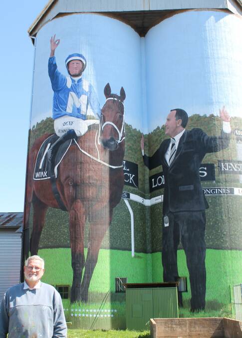 Artist Peter Mortimore and his work on the western side of the silos.